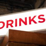 Storytelling Marketing - A sign that says drinks on it