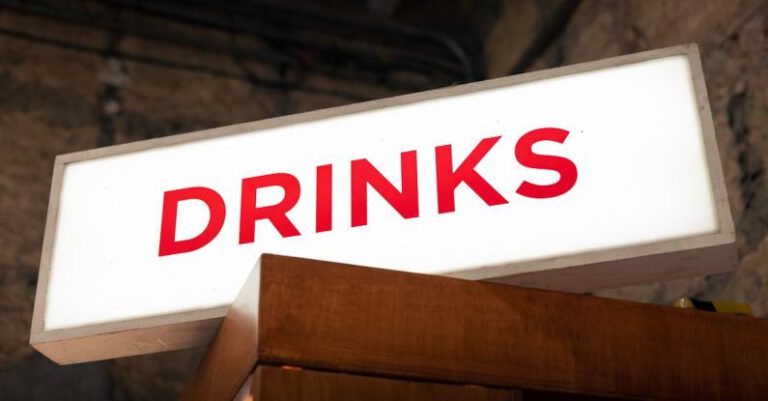 Storytelling Marketing - A sign that says drinks on it