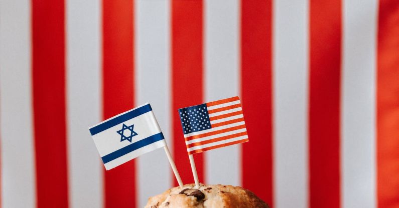 Business Integrity - Tasty muffin with national flags of USA and Israel