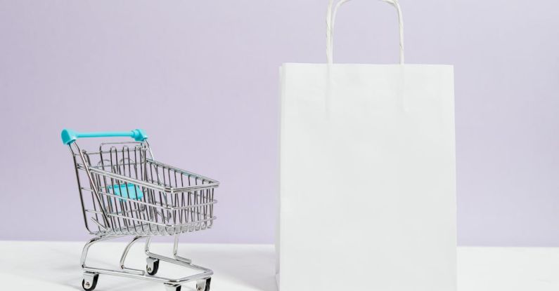 E-commerce Cybersecurity - Push Cart and a White Paperbag