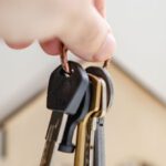 Irresistible Offer - Person with keys for real estate