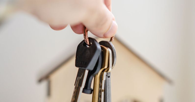 Irresistible Offer - Person with keys for real estate