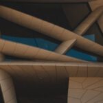 Crm Innovations - Beige Modern Building with Abstract Structure and Pattern